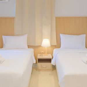Zimmer mit zwei Einzelbetten